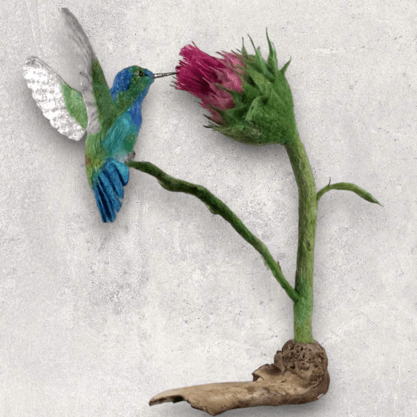 Hummingbird Sculpture posed in nature